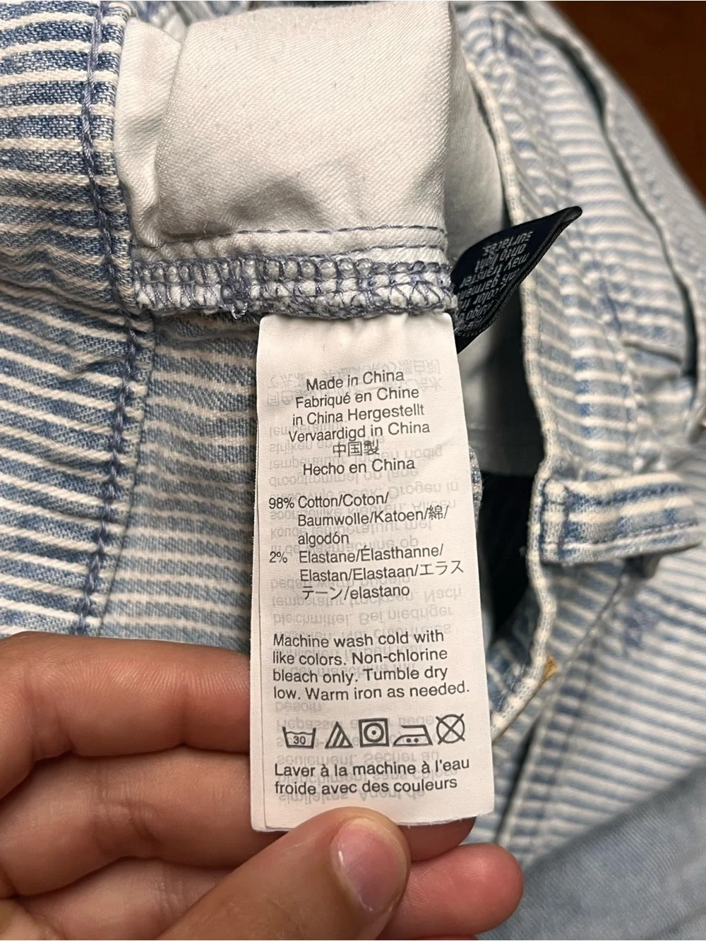 Madewell railroad striped 10” high rise skinny crop jeans with raw hem